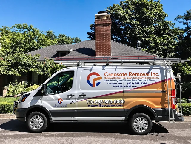 Bedford Heights Chimney Sweep technician removing creosote safely in Bedford Heights, OH