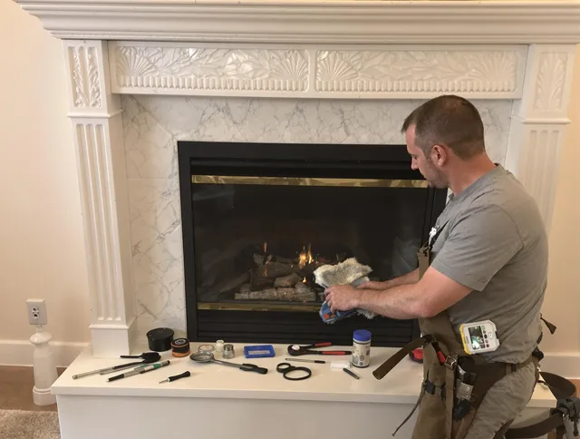 Bedford Heights Chimney Sweep performing fireplace maintenance in Bedford Heights, OH